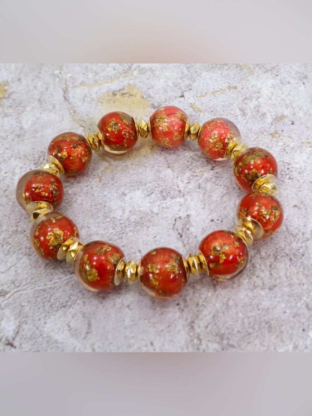 Red and gold bead stretch bracelet with gold leaf resin beads gold spacers New